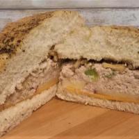 Lt'S Tuna Sandwich - Half Size · Homemade tuna salad, apple slices, walnuts and cheddar cheese on toasted homemade focaccia.