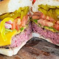 Dry Aged Burger · Lettuce, tomato, onion, pickles, brioche bun.