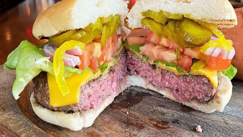 Dry Aged Burger · Lettuce, tomato, onion, pickles, brioche bun.