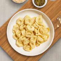 Your Tortellini Plate · Fresh tortellini cooked with your choice of sauce and toppings!