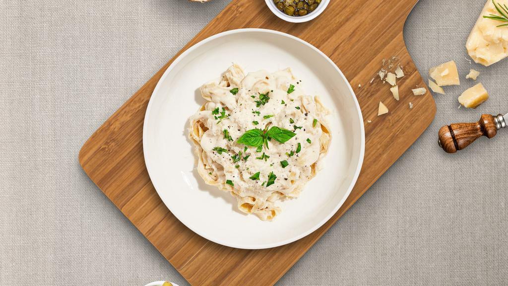 Always Alfredo Pasta (Fettuccine) · Fettuccine pasta cooked in creamy white sauce topped with parmesan.