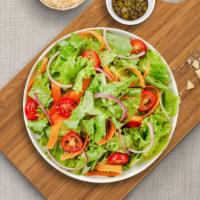 On The House Salad · (Vegetarian) Romaine lettuce, cherry tomatoes, carrots, and onions dressed tossed with lemon...