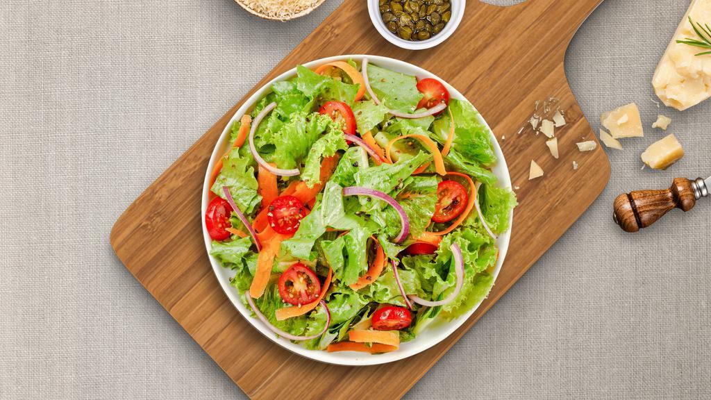 On The House Salad · (Vegetarian) Romaine lettuce, cherry tomatoes, carrots, and onions dressed tossed with lemon juice & olive oil