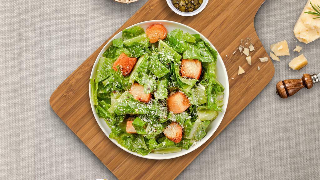 Caesar'S Corner Salad · (Vegetarian) Romaine lettuce, house croutons, and parmesan cheese tossed with Caesar dressing.