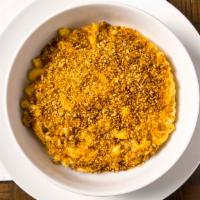 Herb Crusted Mac & Cheese · Creamy, cheesy, macaroni baked to perfection with a herb crust.