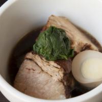 Butakaku Appetizer · Braised pork belly simmered in a soy based sauce.