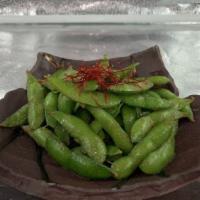 Garlic Edamame · Soybeans that are boiled, then grilled with garlic aioli sauce and anchovies.