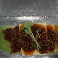 Spicy Hiyayako · Vegan. Chilled tofu topped with radish sprouts and spicy garlic chili sauce.
