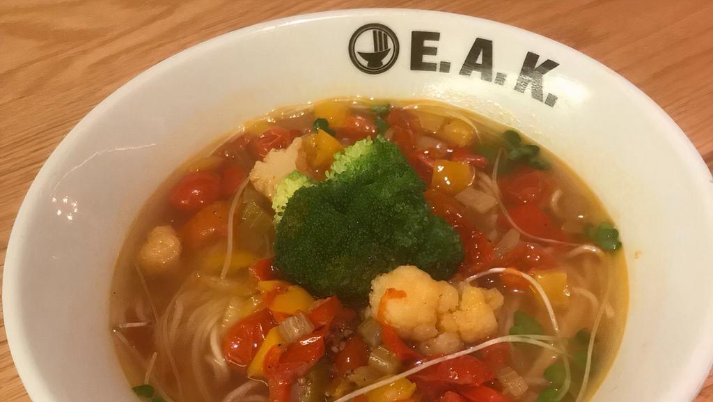 V-Garden Ramen · Vegan. Vegetable broth, shio tare and thin wavy noodles. Red and yellow bell peppers. Tomatoes, cauliflower, broccoli celery, and radish sprouts.