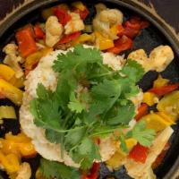 Veggie Fried Rice · Vegan. Chopped red, yellow bell peppers, mini tomatoes, celery and cauliflower diced with ci...