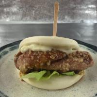Chicken Bao · Bun with juicy fried chicken thigh, lettuce with homemade honey mustard sauce.