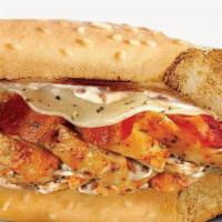 Chicken Carbonara Sub · Oven roasted chicken breast strips, bacon, provolone cheese, sautéed mushrooms, and creamy b...