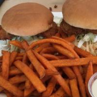 Shrimp Burgers (2) W/ Fries · Two Shrimp Burgers served with French Fries.

***Menu price on DoorDash differs from our reg...