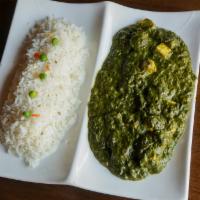 Saag Paneer · Fresh spinach cooked with homemade cottage cheese in a mildly spiced cream sauce.