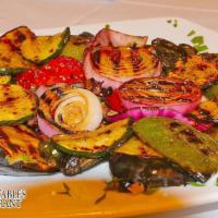 Greek Salad · Lettuce, Tomato, Cucumber, Onion, Feta, Olives, Peppers, Olive Oil and Vinegar