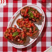 Bruschetta · Grilled bread topped with roma tomatoes, basil, garlic, and olive oil.