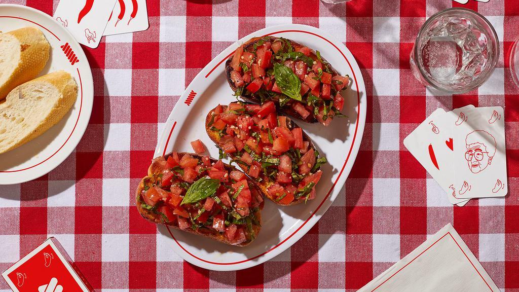 Bruschetta · Grilled bread topped with roma tomatoes, basil, garlic, and olive oil.
