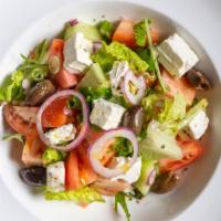 Traditional Greek Salad · Romaine lettuce, tomatoes, cucumbers, feta cheese, red onions, kalamata olives & extra virgi...