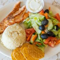 Broiled Salmon · Served with rice and garden salad.