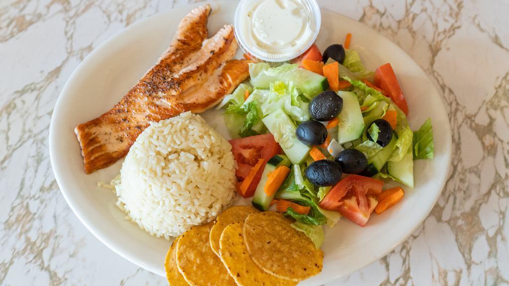 Broiled Salmon · Served with rice and garden salad.
