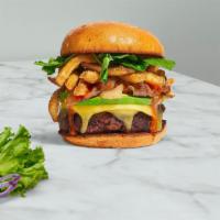 Fries The First Burger · American beef patty topped with fries, avocado, caramelized onions, ketchup, lettuce, tomato...