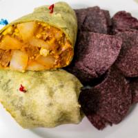 The Breakfast Wrap · The classic 'b-wrap' consists of our house seasoned organic tofu scramble, home fries and gr...