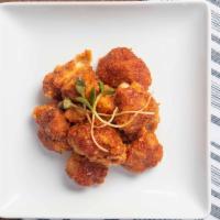 Bbq Cauliflower · Gluten free option. Oven-baked cauliflower breaded in bread crumbs and smothered in house bb...