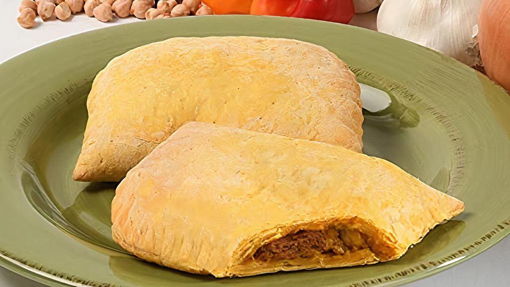 Curry Jackfruit With Chickpea Patty · Curry jackfruit with chickpea patty. Made with all natural, all vegan ingredients. Delicious, flaky pastry crust. Makes for a great meal or snack.