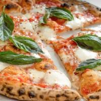 Margherita Pizza. · organic italian tomatoes, fior di latte, basil and extra virgin olive oil
