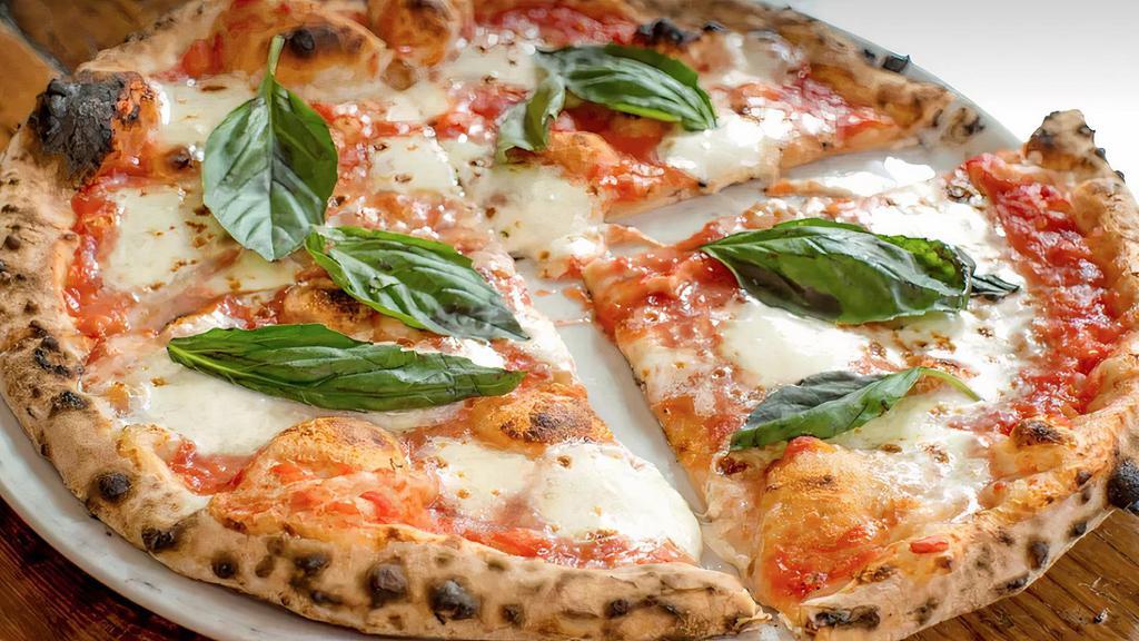 Margherita Pizza. · organic italian tomatoes, fior di latte, basil and extra virgin olive oil