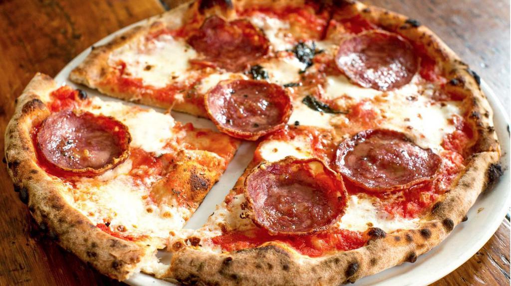 Sopressata  Pizza. · organic italian tomatoes, fior di latte, garlic, oregano and extra virgin olive oil.  Try it with Mike's Hot Honey, it's delicious!