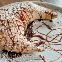 Nutella Calzone. · bananas and optional walnuts. . with a scoop of gelato add 4