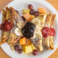 French Toast · With fresh fruit and powder sugar.
