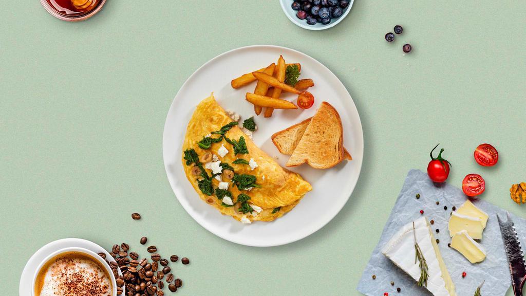 Spinach And Feta Cheese Omelette · Eggs cooked with spinach, feta cheese, onion, and tomatoes as an omellete. Served with your choice of bread.