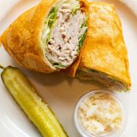Turkey Wrap · Sliced fresh roasted turkey, Swiss cheese and chopped lettuce on a tomato basil pita with a ...