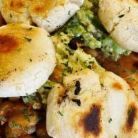 Arepas · Contains nuts, gluten free. 2 pieces. Homemade dough from corn flour grilled, stuffed with q...