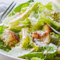 Chicken Caesar Salad · Romain lettuce tossed in Chef’s Caesar dressing topped with croutons and grilled marinated c...