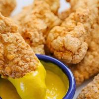 Chicken Tenders  · 6 breaded deep fried chicken served with honey mustard