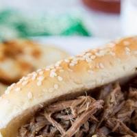 Philly Cheese Steak · Marinated shaved roast beef served on a toasted wedge topped with melted cheddar cheese.  Se...
