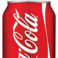 Coke · 12 ounce can of Coke