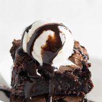 Chocolate Brownie · Fudgy chocolate brownie topped with vanilla ice cream.