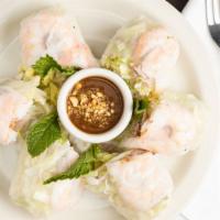 Fresh Summer Roll (3) · Spring rolls. A Vietnamese delight. Rice paper stuffed with shrimp, pork, and noodles. Serve...