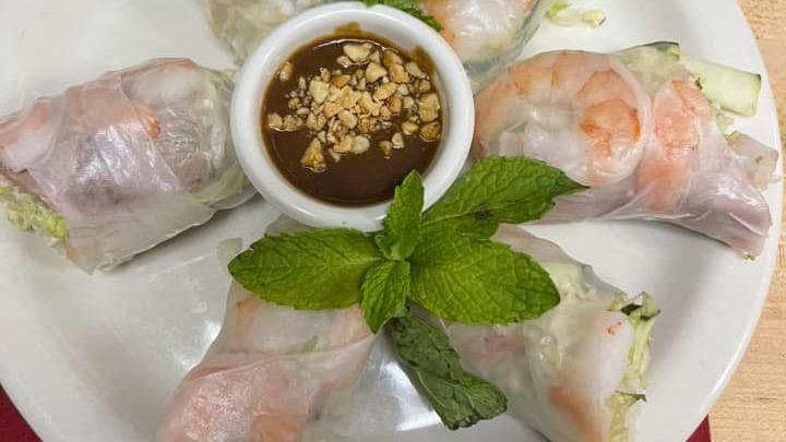 Fresh Vegetarian Rolls · Rice paper stuffed with tofu, sautéed mixed vegetables, noodles, and lettuce, served with peanut dipping sauce.
