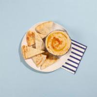 Hummus & Pita · Chickpea puree with tahini, lemon, and garlic.