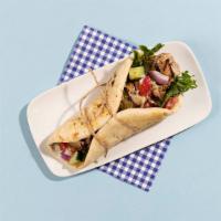 Chicken Souvlaki Pita · Grilled chicken skewer wrapped in a pita with lettuce, tomato, onion, and tzatziki.