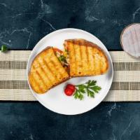 On The Grill Chicken Panini · Grilled chicken, grilled onions, spinach, muenster cheese, beef bacon, lettuce, and tomato o...