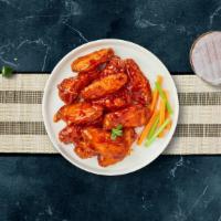 Buffalo Rider Wings · (5 pieces) Fresh chicken wings breaded, fried until golden brown, and tossed in buffalo sauce.