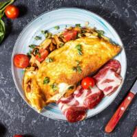The Hammy Omelette · 3 freshly scrambled eggs mixed with loads of country ham and cheddar cheese. Comes with your...
