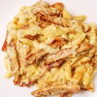 Pasta With Alfredo Sauce & Chicken · With alfredo sauce and chicken.
