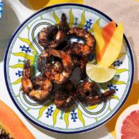 Jerk Shrimp · Grilled shrimp marinated in house jerk sauce.